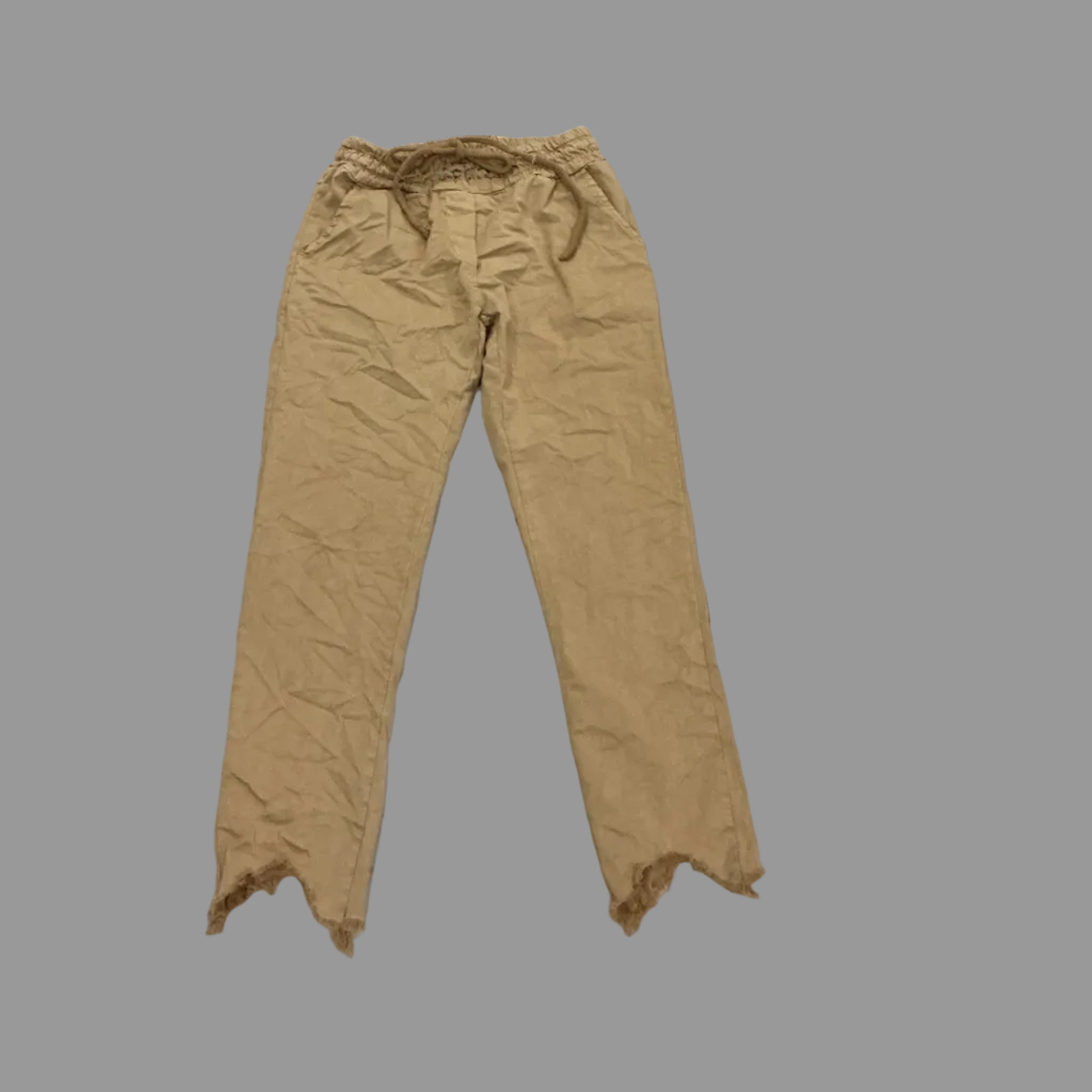 Beige pants on a gray background