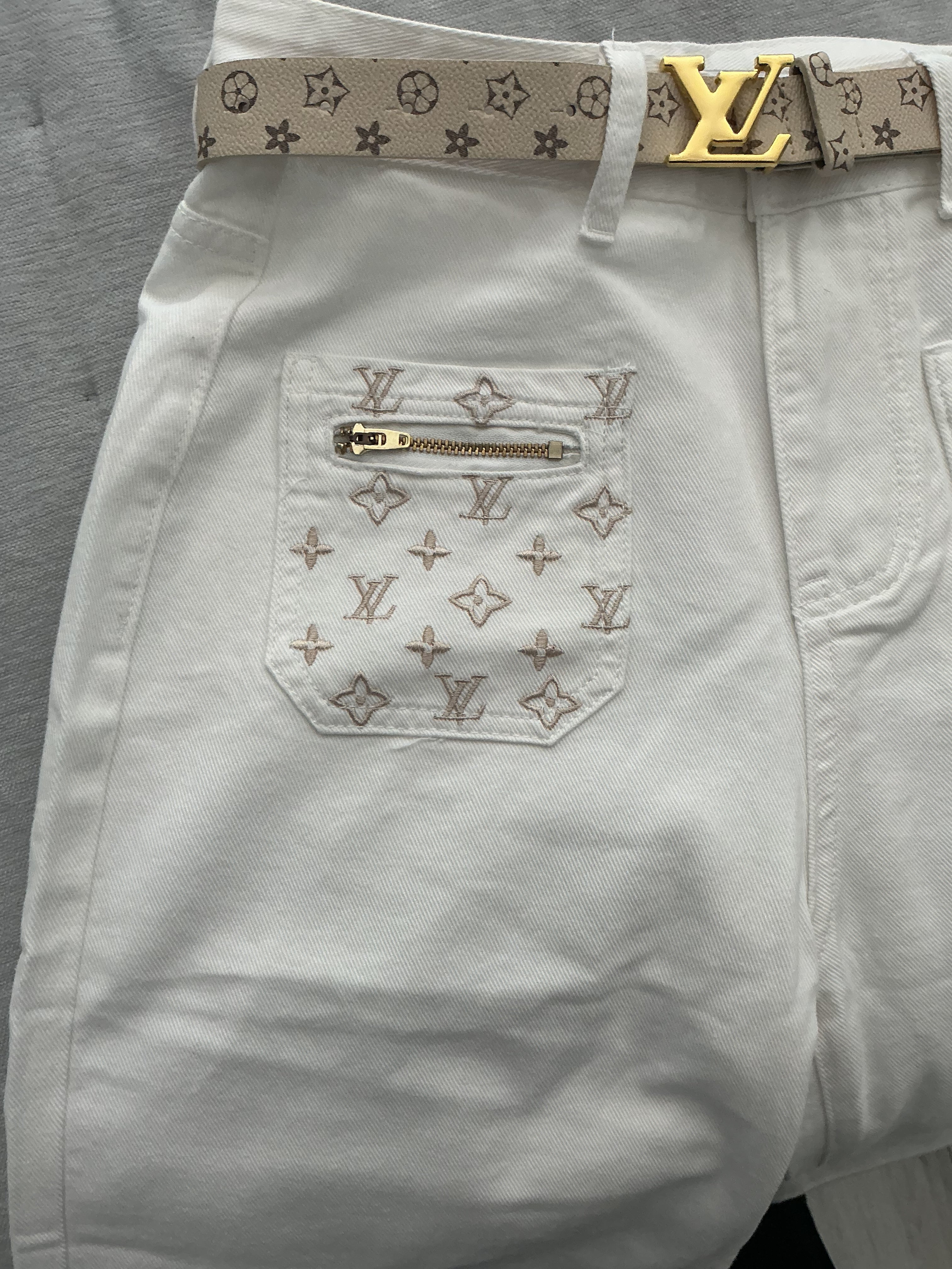 beautifully designed white jeans with belt